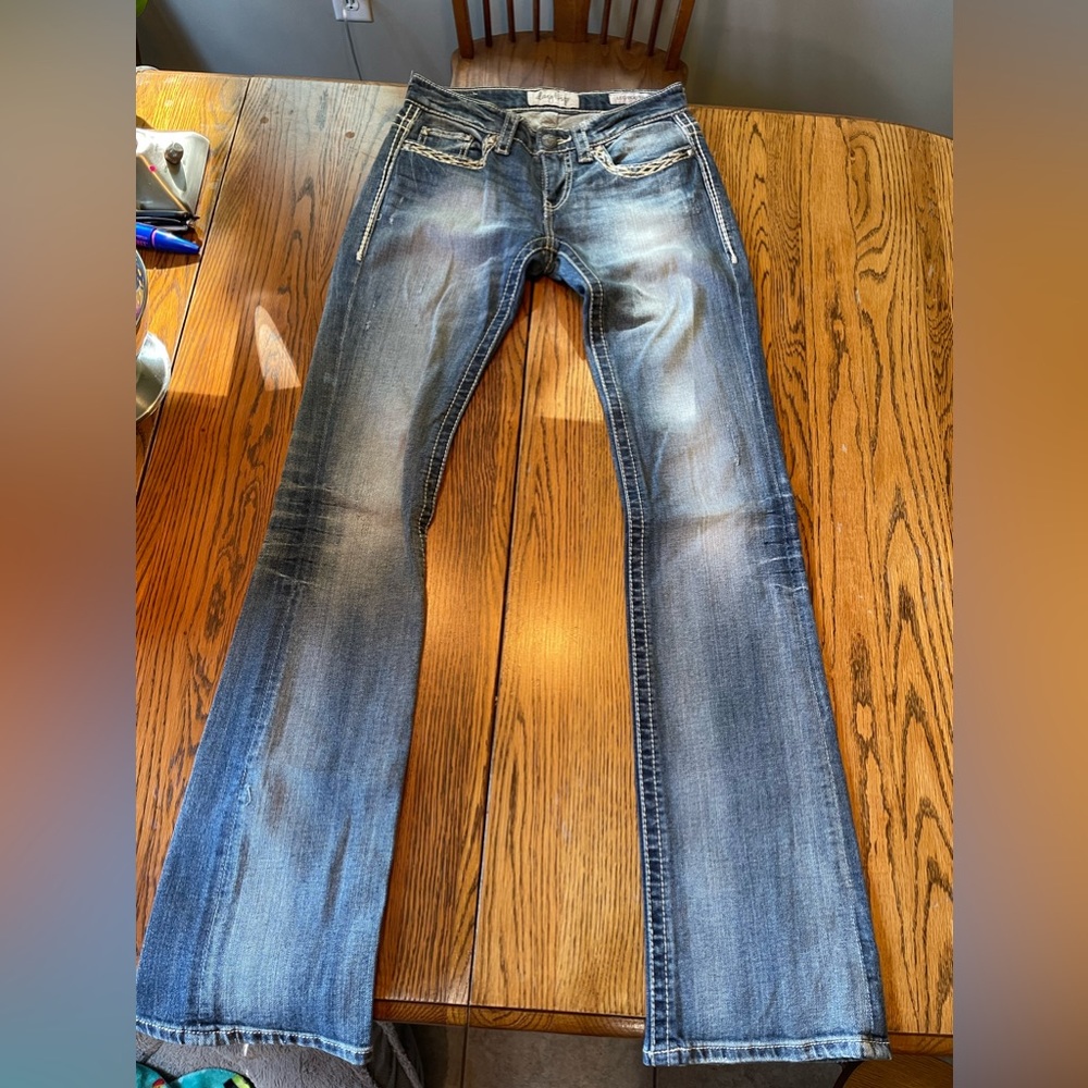 Women’s buckle jeans